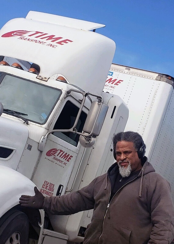 Time Transport Freight Truck Driver With His Truck